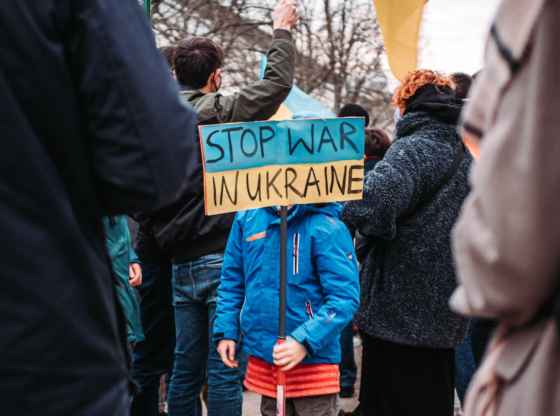 Child Holding flag of War